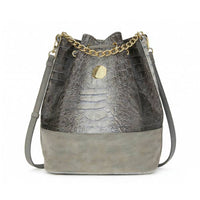 Gray two-tone crocodile-embossed bucket bag with gold chain drawstring and octagonal emblem, versatile shoulder bag for wholesale.