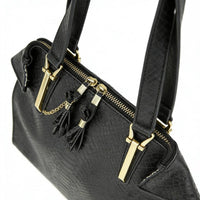Black structured satchel bag with snakeskin embossing, gold hardware, and tassel details, professional work bag for women.