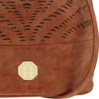 Tan Bucket Bag - Perforated Cutout & Gold Monogram Emblem Detail View