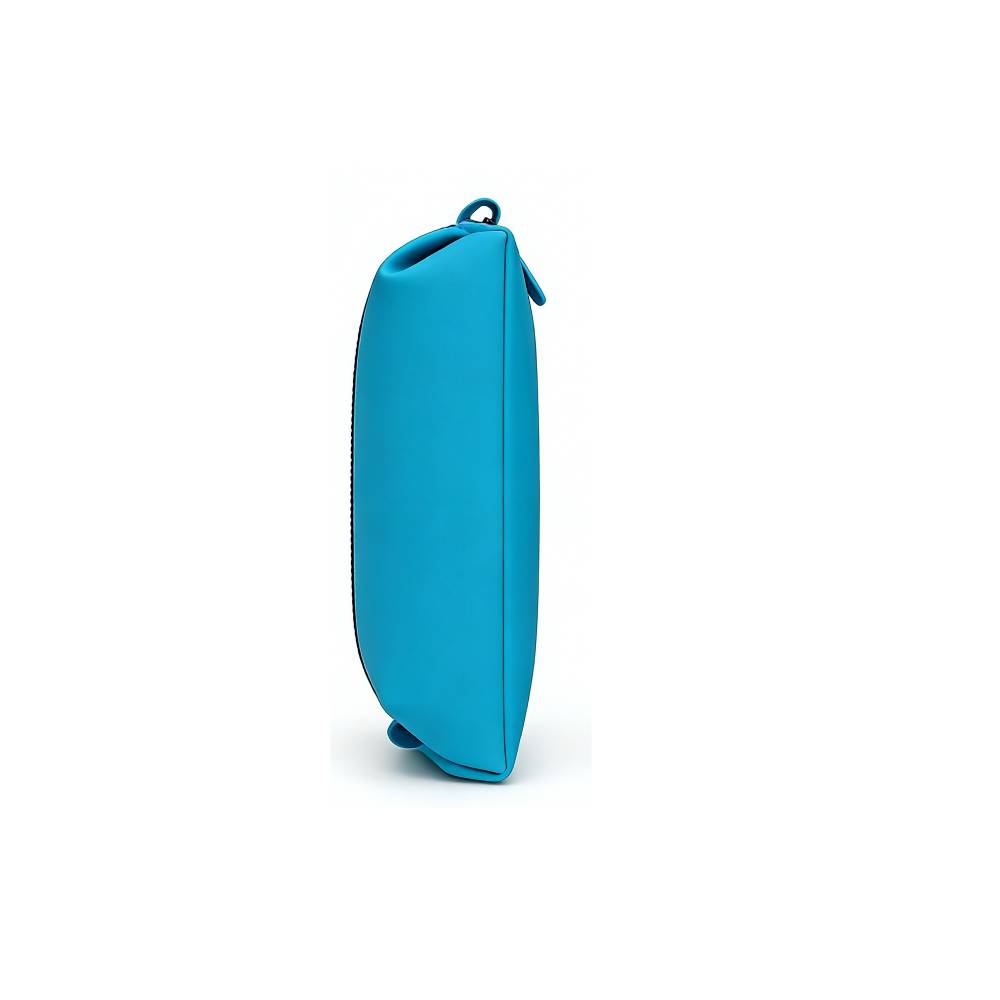 Angled view of a bright blue soft-sided toiletry bag, showing flexible fabric structure, black zipper, and functional loop handle.