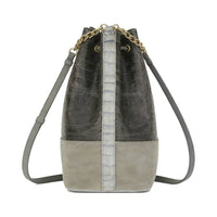 Gray bucket bag with detachable top handle and adjustable crossbody strap, elegant casual drawstring purse for women.