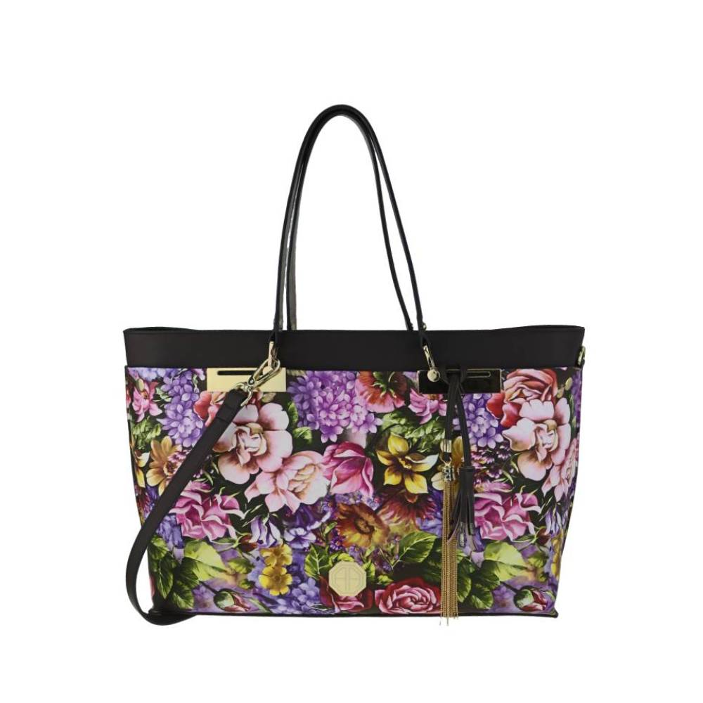Large floral print tote bag with black leather top, gold hardware, and tassel details, versatile shoulder bag for wholesale.