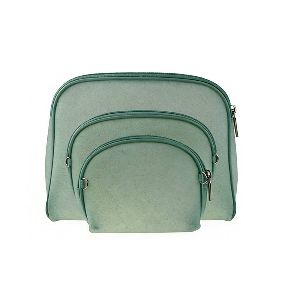 Side view of a small mint green zippered pouch with silver metal zipper pull, showing compact structured shape and precise stitching.