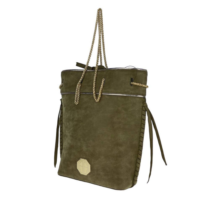Side view of olive green suede tote bag with braided side tassels and metallic trim, showing spacious structured shape.