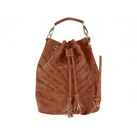 Side view of tan bucket bag with top handle and adjustable crossbody strap, showing spacious capacity and structured shape.