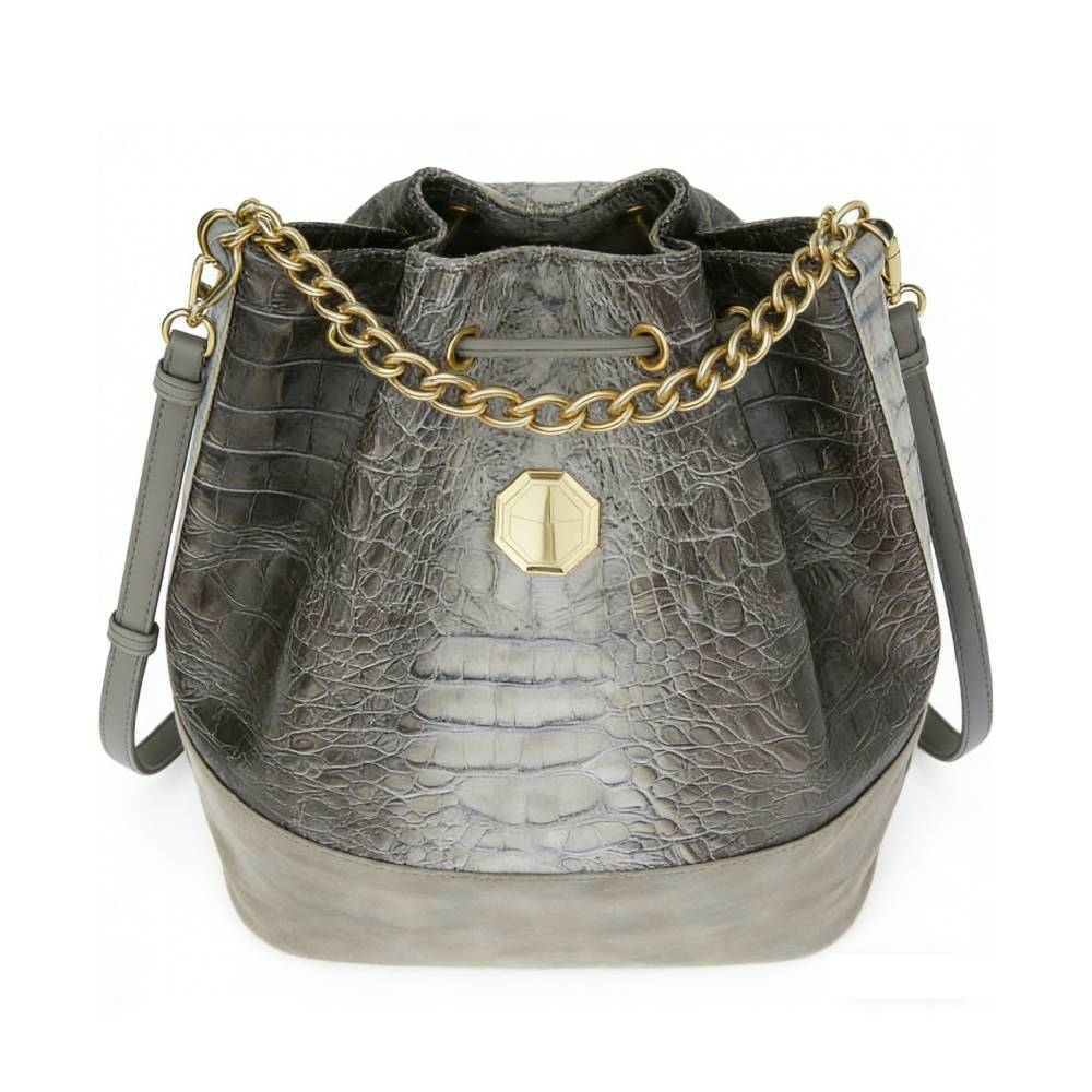 Gray two-tone crocodile-embossed bucket bag with gold chain drawstring, octagonal gold emblem, smooth suede-like base, and adjustable crossbody strap, durable luxury shoulder bag for wholesale and everyday fashion.