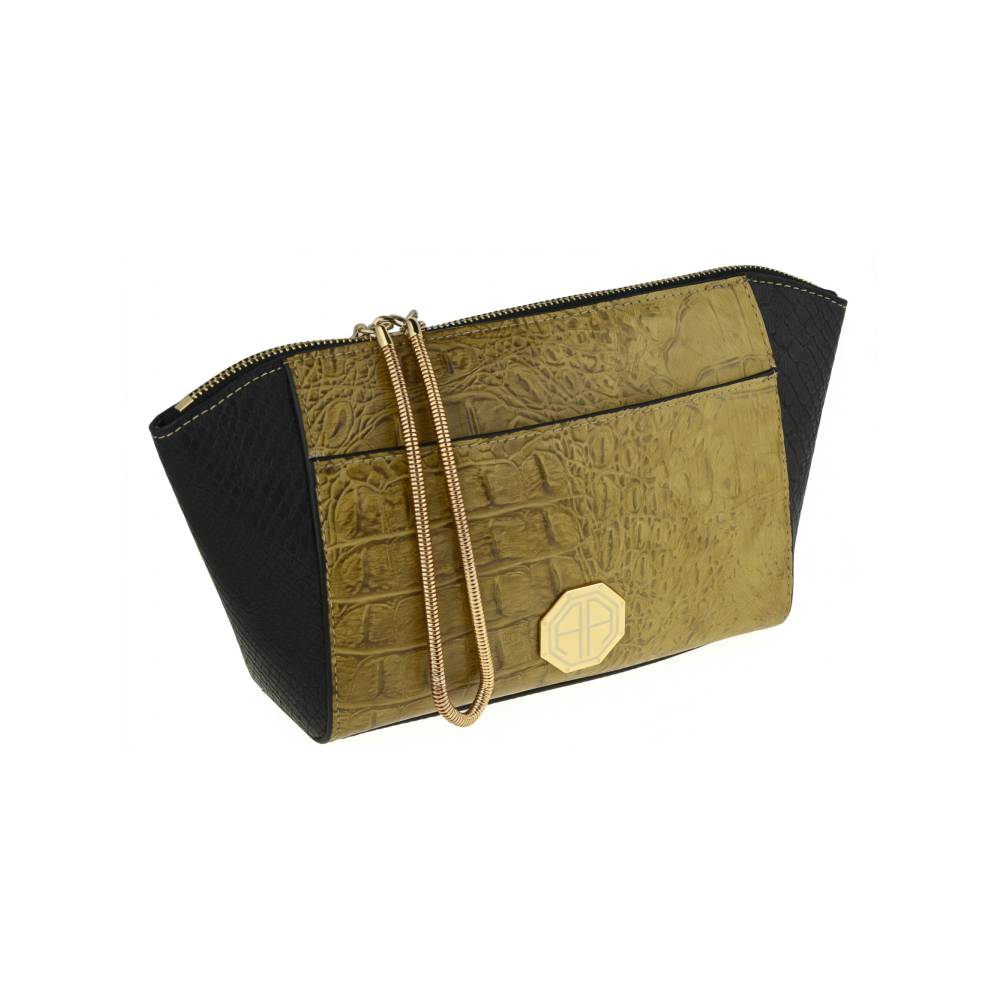 Side view of structured two-tone clutch bag, showing compact shape and mixed crocodile/snakeskin texture.