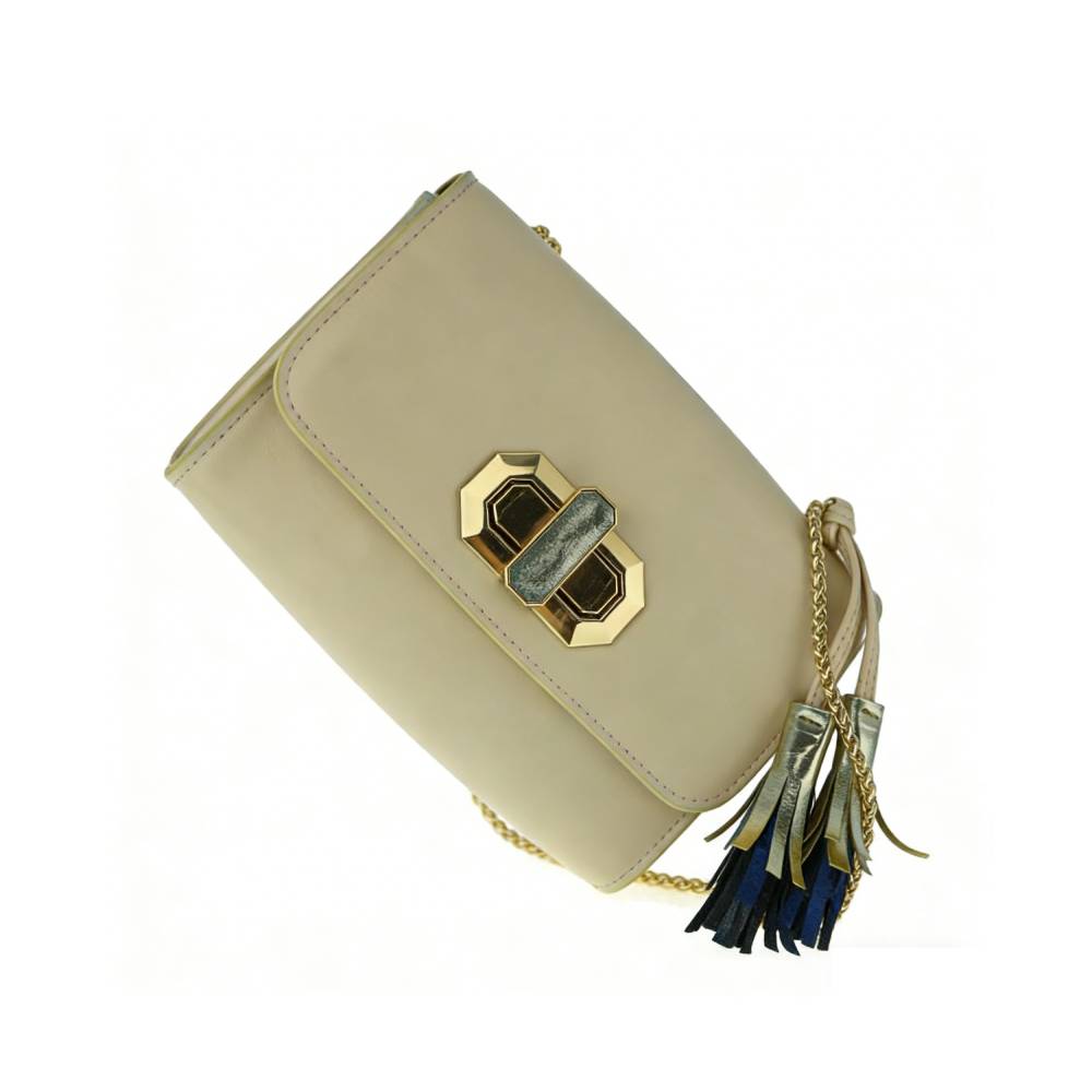 Beige flap shoulder bag with geometric gold turn-lock closure and multi-color tassel, elegant casual everyday purse.