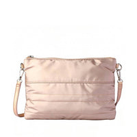 Front view of a rose gold quilted crossbody bag with detachable shoulder straps, ideal for product listing and wholesale catalogs.
