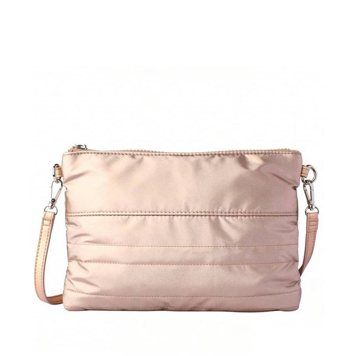 Front view of a rose gold quilted crossbody bag with detachable shoulder straps, ideal for product listing and wholesale catalogs.