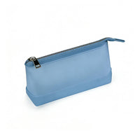 Light blue frosted translucent zippered pouch with solid rubber base and silver metal zipper pull, showcasing a sleek and practical storage solution.