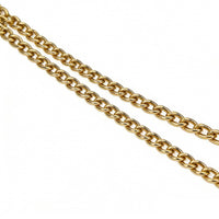 Close-up of double gold curb chain straps for suede tote bag, showcasing sturdy and luxurious hardware.