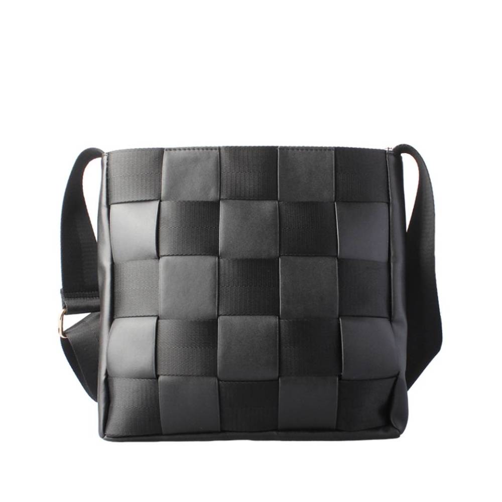 Front view of a black smooth leather crossbody bag with a top zippered pocket and gold hardware, offering a sleek and professional aesthetic.