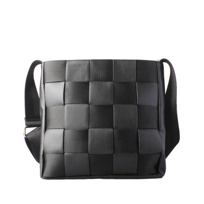 Front view of a black smooth leather crossbody bag with a top zippered pocket and gold hardware, offering a sleek and professional aesthetic.
