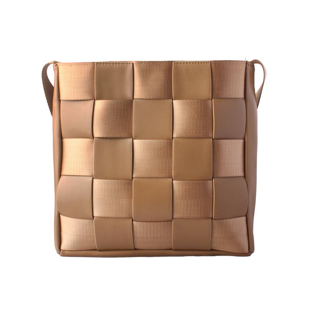 Front view of a tan woven crossbody bag with a checkered leather-webbing pattern, ideal for product listing and wholesale catalogs.