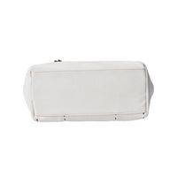 Side view of white pebbled leather tote bag, showing spacious capacity and durable construction.