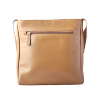 Front view of a tan smooth leather crossbody bag with a top zippered pocket and gold zipper pull, showcasing a minimalist rectangular design.