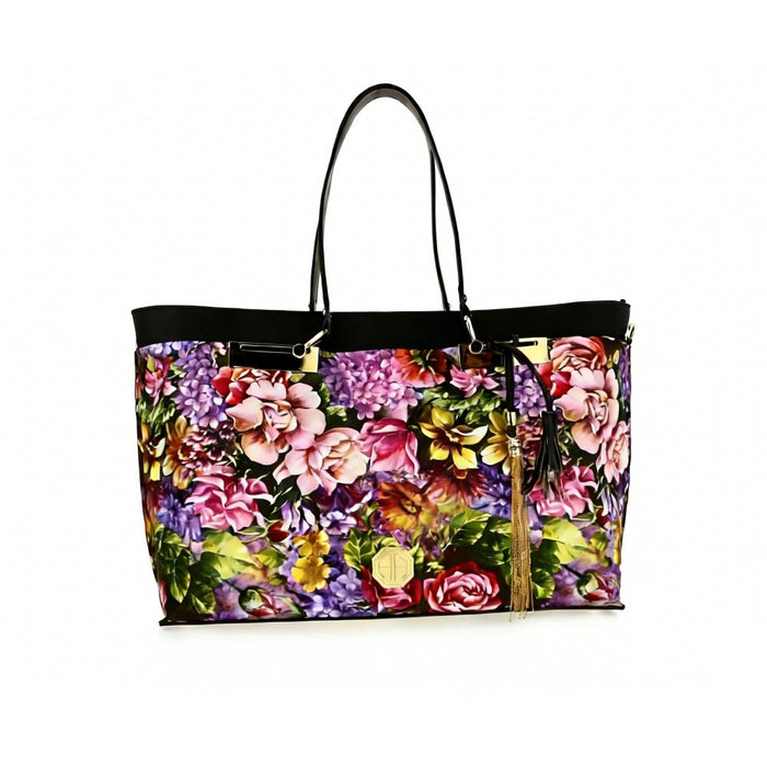 Side view of vibrant floral tote bag with adjustable crossbody strap, showing spacious capacity and structured shape.