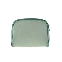 Large mint green curved-top zippered pouch with smooth texture and silver zipper pull, designed for spacious storage of essentials.